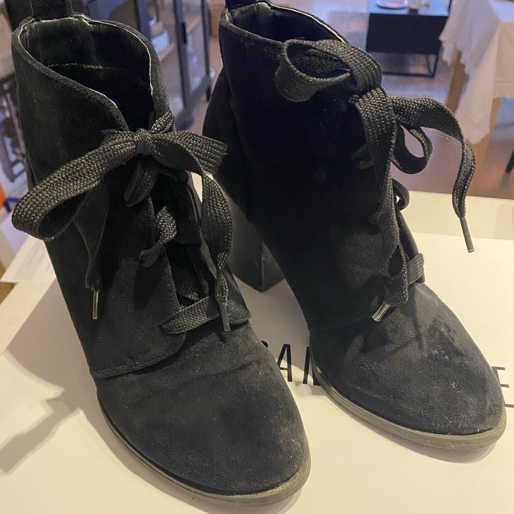 Black heeled lace up boots
